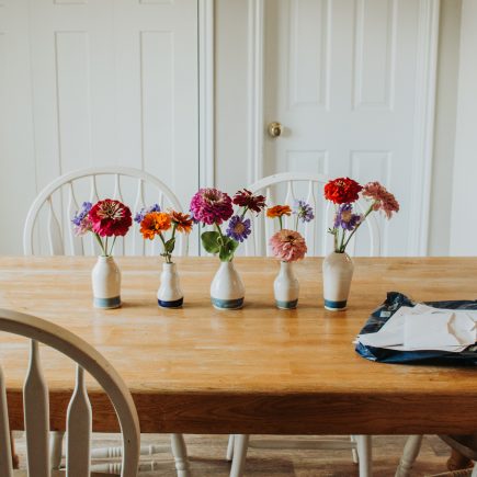 stack of mail on kitchen table