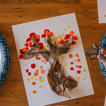fall tree with fingerprint leaves