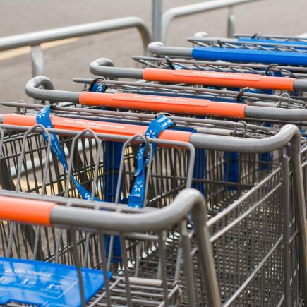 row of empty grocery carts