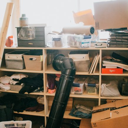 cluttered master closet