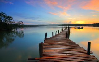 beach pier at sunset