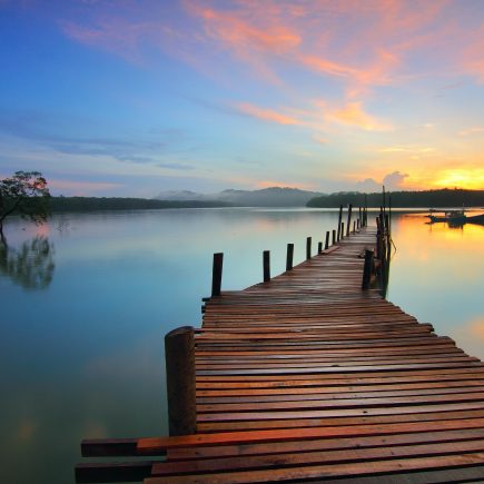 beach pier at sunset