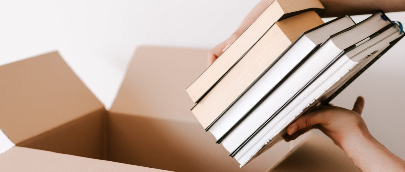 putting books in donation box
