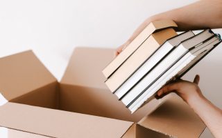 putting books in donation box