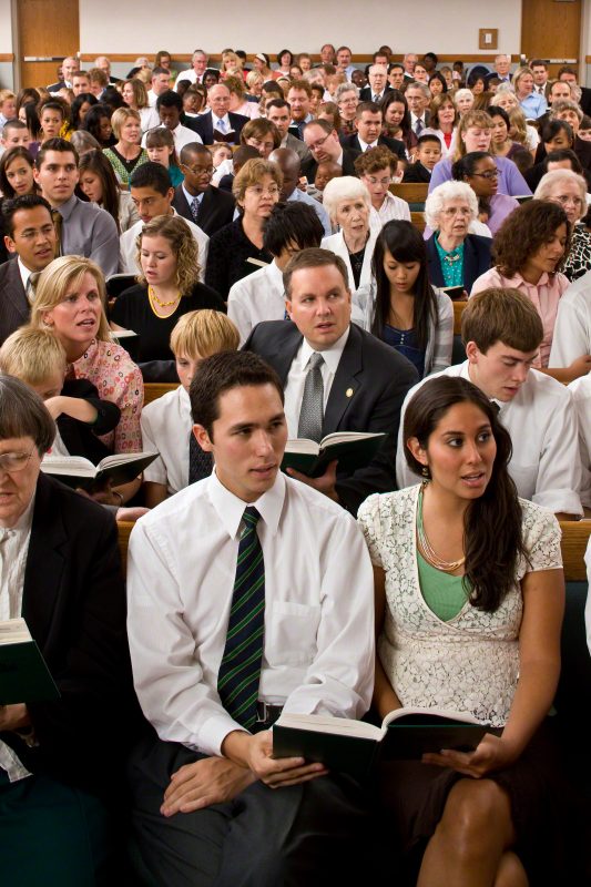 church congregation singing a hymn